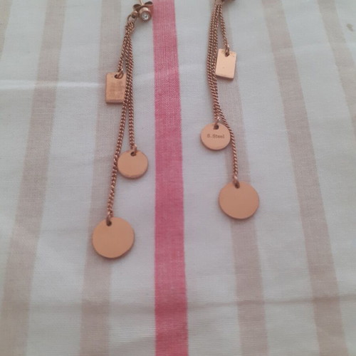 Triple hanging earrings made of steel in gold color like new