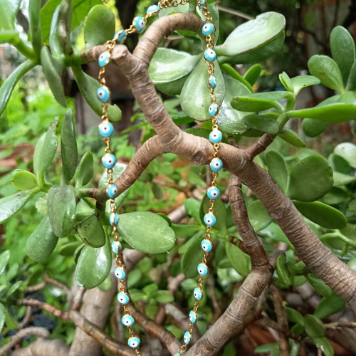 Necklace with blue evil eyes in gold color like new