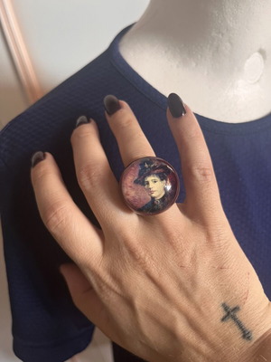 Ring used with purple color and small crack