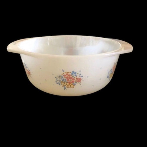 White serving dishes used, oval with lid and large bowl with floral design