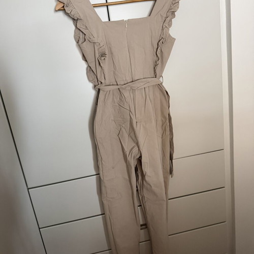 Jumpsuit with ruffles beige, one size, like new