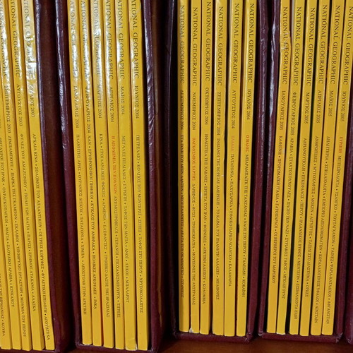 National Geographic magazines like new, 85 issues in custom leather cases