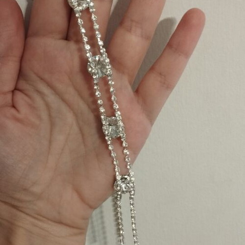 Evening jewelry set necklace-lariat and earrings with strass, new, silver-tone