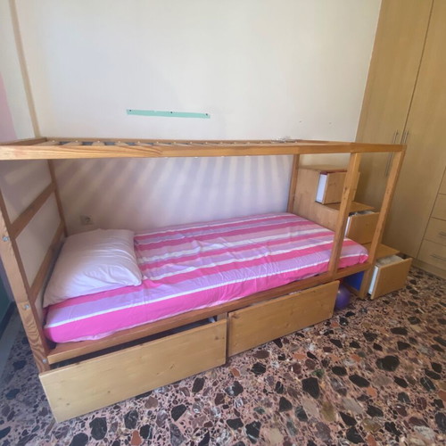 Kura bed used with convertible bunk and storage drawers