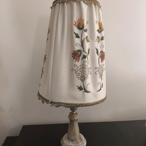 Vintage table lamp with embroidered fabric shade used