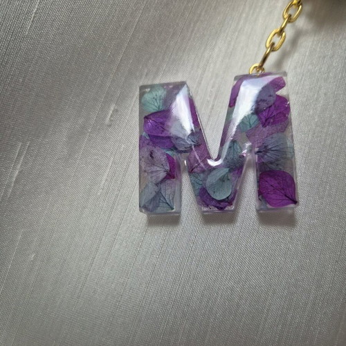 Handmade monogram keychain from resin custom made with purple and turquoise flowers