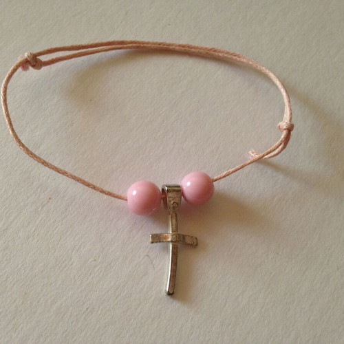 Pink bracelet used with silver cross and pink beads