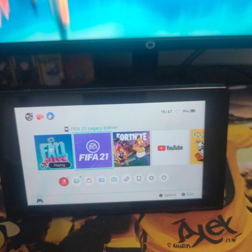 Nintendo Switch console with controller used