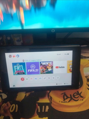 Nintendo Switch console with controller used