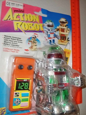 Action robot toy new with remote control, silver color from the 90s