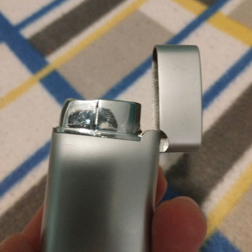 Assos International lighter used, collectible