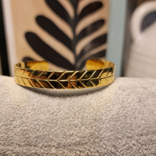 Cuff bracelet made of stainless steel new, gold color with embossed design