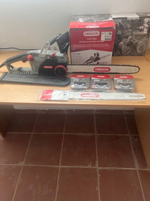 Oregon CS1500 self-sharpening electric chainsaw like new