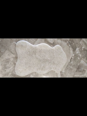 Sheepskin Faux Fur Rug like new, ivory beige irregular shape