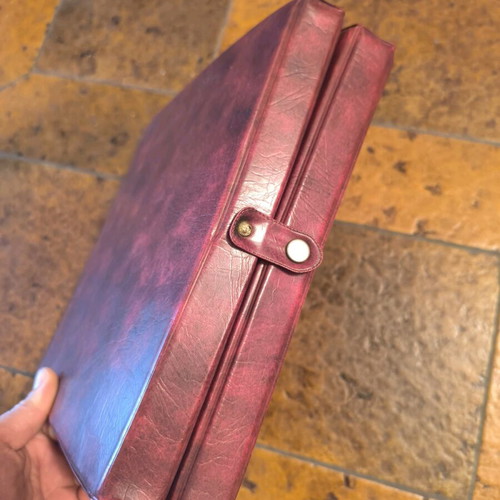 Leather case for cassettes used, with cassettes included