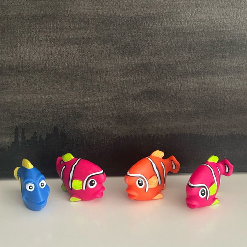 Finding Nemo style bath toys set like new, 4 colorful rubber fish