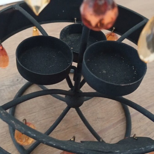 Black metal candle holder with 3 candle slots