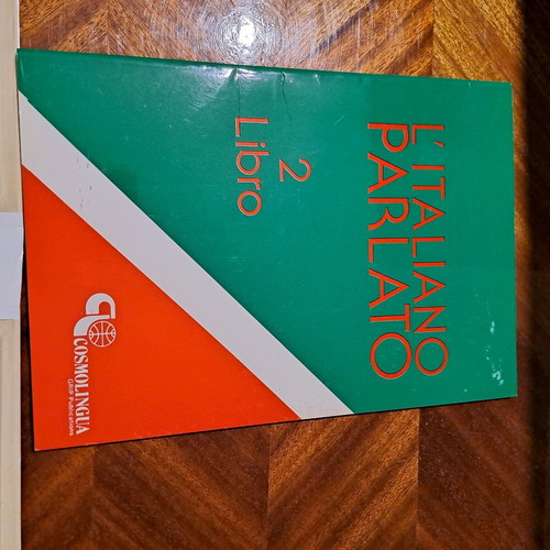 Cosmolingua Italian case like new with book and 12 cassettes