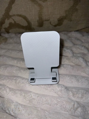 Mobile phone stand new, foldable for easy transport and storage