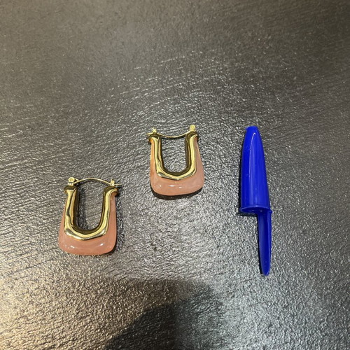 U-shaped earrings with gold finish and pink enamel, like new