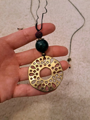 Long handmade necklace with gold element like new