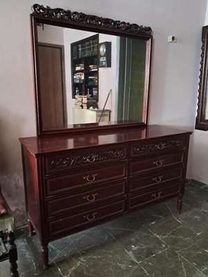 Wooden vintage bedroom furniture set used with signs of wear