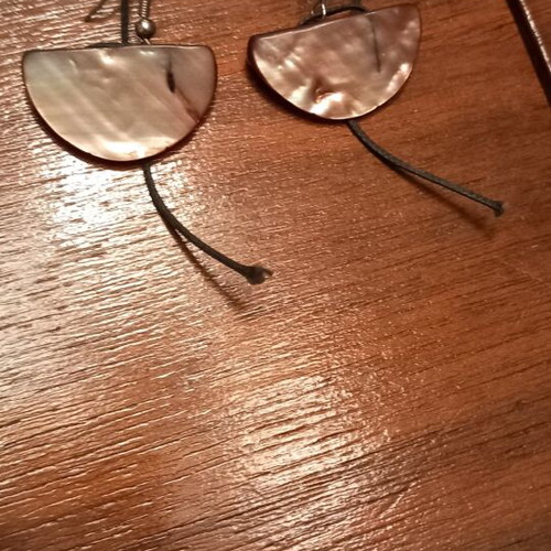 Earrings like new made of natural shell material