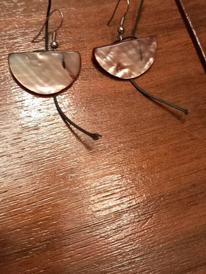 Earrings like new made of natural shell material