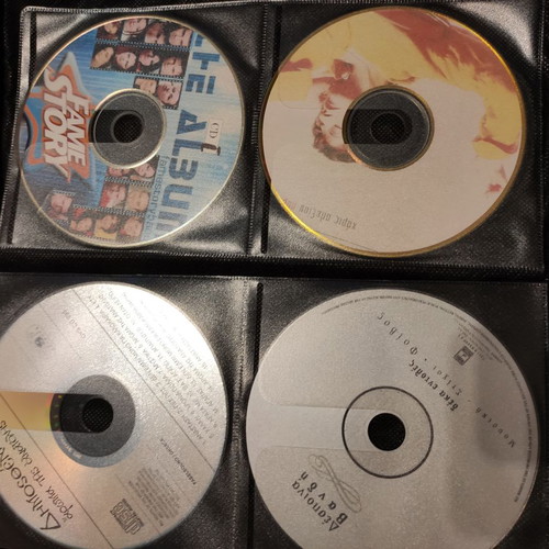 Set of 48 used music CDs with free case
