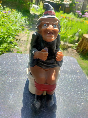 Angry witch figure used with music
