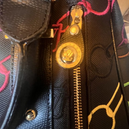 Black shoulder bag with colorful embroidery, like new