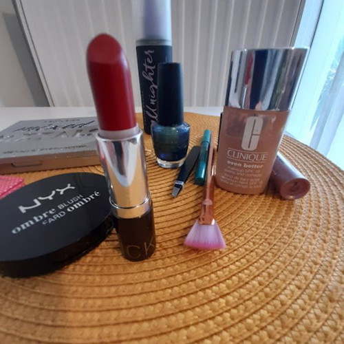 Set of used cosmetics with new Maybeline Sky High mascara