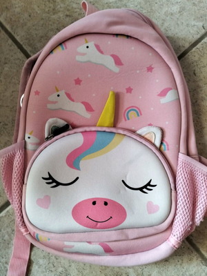 Kindergarten bag pink unicorn with wear on one pocket