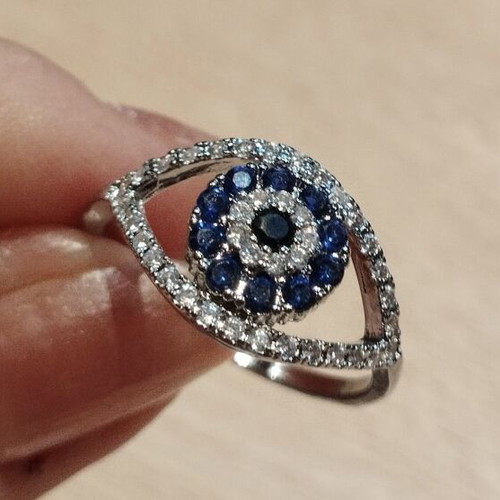 Luxury ring with blue and zircon stones, like new
