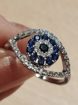 Luxury ring with blue and zircon stones, like new