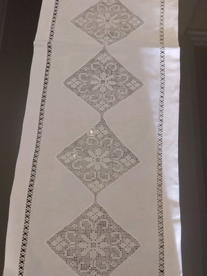 Table runner with knitted decoration and handmade openwork unused