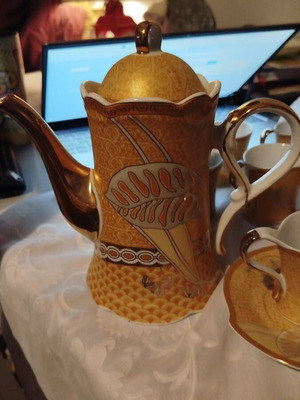 Porcelain tea serving set like new with gold details