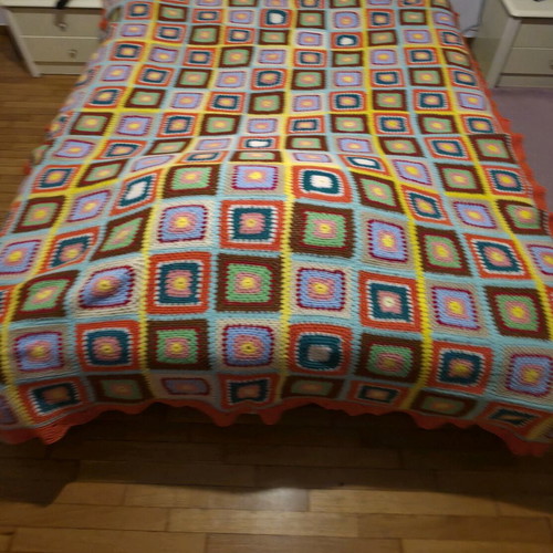 Handmade knitted quilt used for double bed