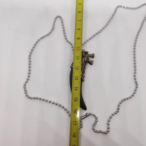 Necklace with wolf tooth pendant like new, gold and black