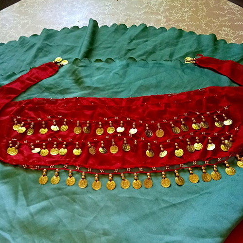 Dance skirt new, decorated with coins and ethnic elements, fiery red