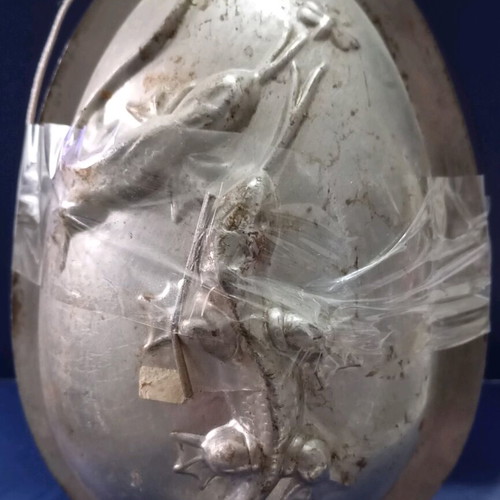 Easter mold used for chocolate egg with children and gifts design