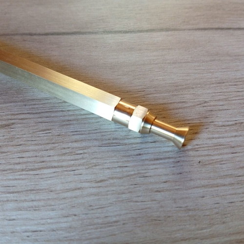 Hexagonal brass pen used, with g2 refill included