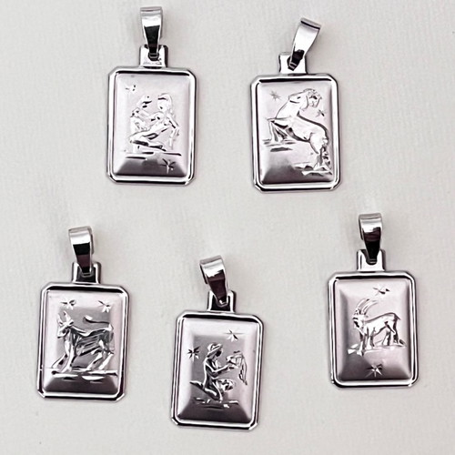 Zodiac white gold k14 pendant like new, platinum plated