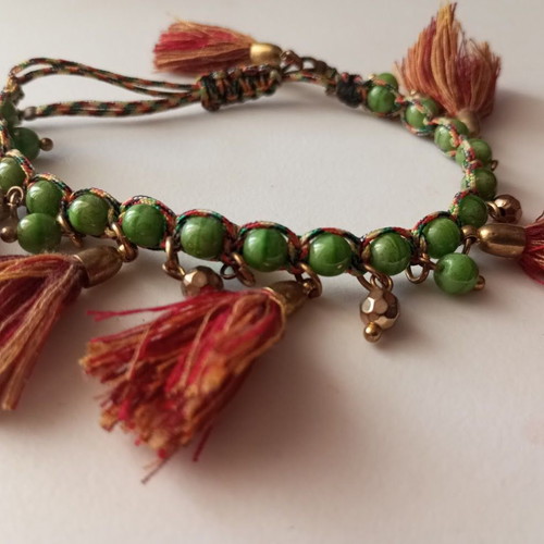 Bracelet new with green beads and red tassels boho style