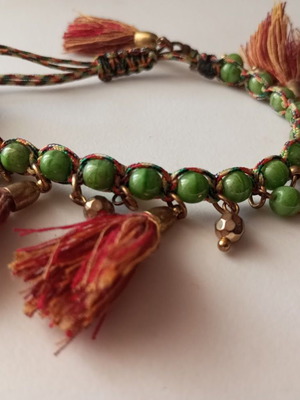 Bracelet new with green beads and red tassels boho style