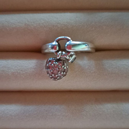 Silver ring with 2 charms like new