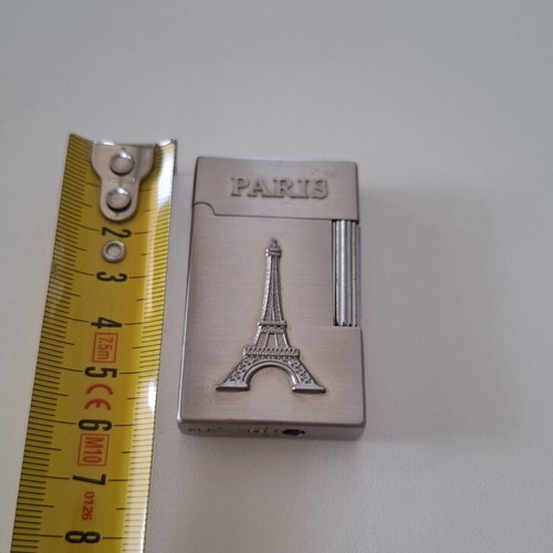 Gas lighter with Eiffel Tower design, like new