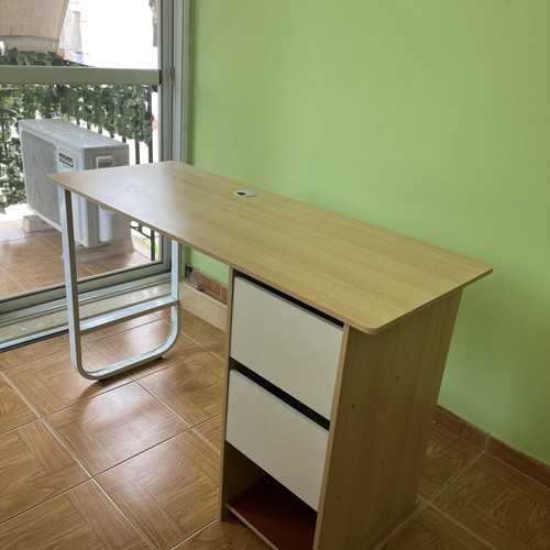 Wooden room desk used with minor wear