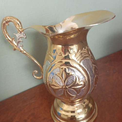 Zeon pitcher with two-tone plate, new religious vessel