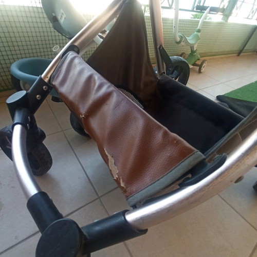 Multifunctional stroller used, foldable in two parts, beige brown gold